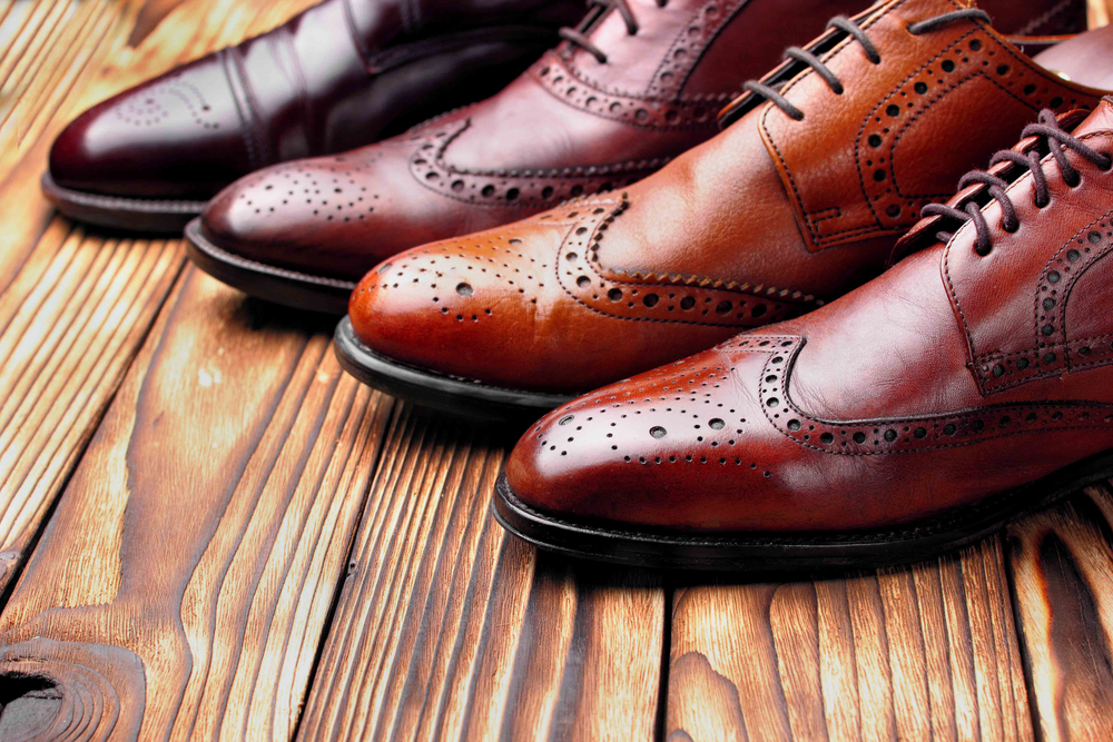 Assortment of brown men's dress shoes for suit pairing guide on Libin’s blog