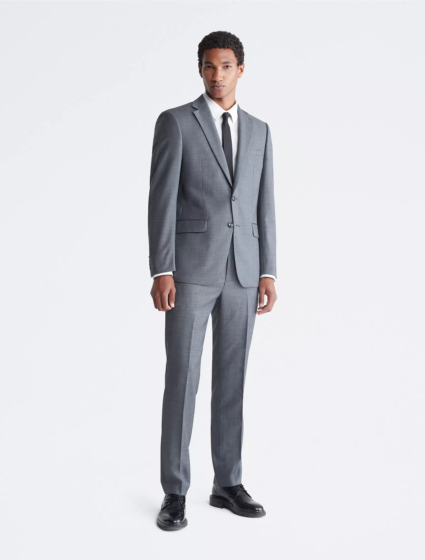 Calvin grey tailored men's suit with slim fit design at Libin’s Menswear